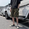 The 2020 summer new casual shorts for men are a trendy brand. The loose straight-leg workwear and five-inch pants are worn outside in a Korean style details Picture